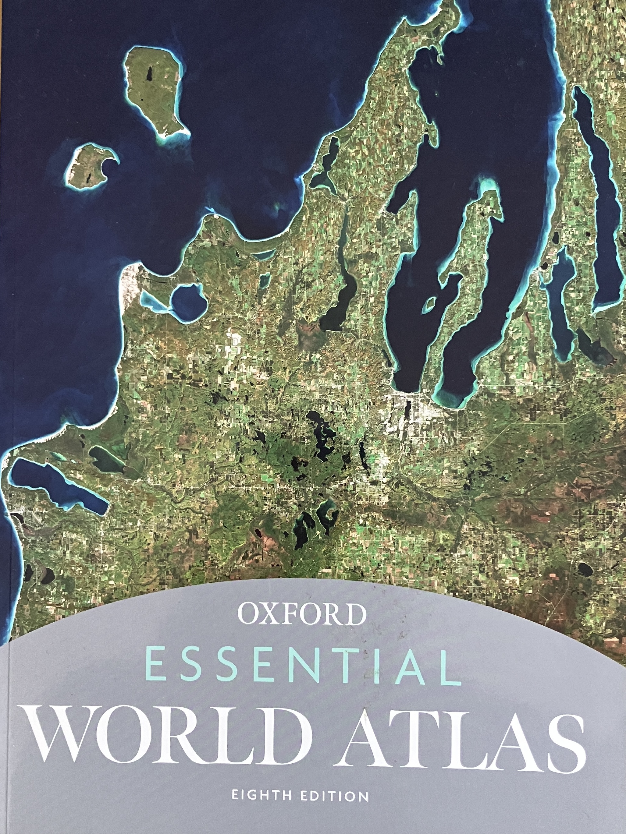 Oxford Essential World Atlas Eighth Edition Cover Design: Brady Mcnamara Cover Image: Leelanau Peninsula, Michigan. U.S. @ European Space Agency